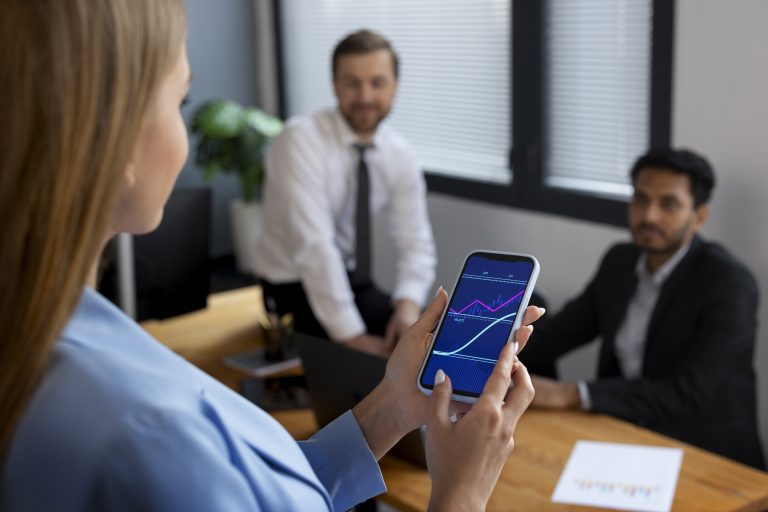 person looking finance graphs 1 How Appointment Setter Online Helped NovaBridge Technologies Build a High-Performing Sales Appointment System