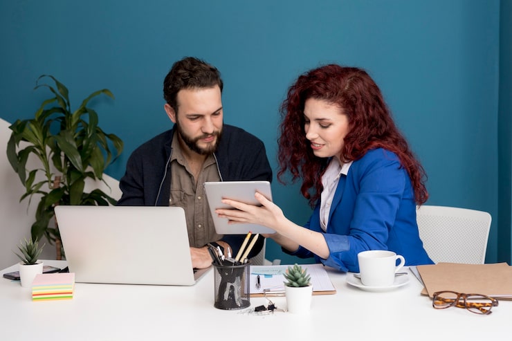 colleagues working planning together 23 2148513798 Boosting B2B Growth for LeadGenX with Appointment Setter Online