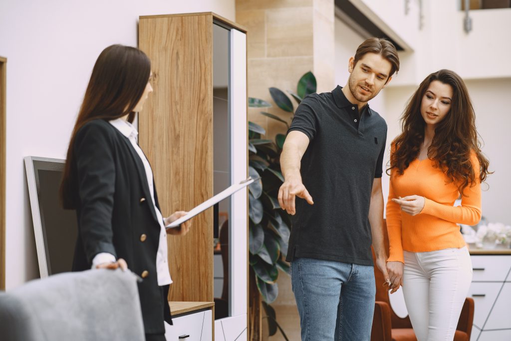 couple with salesman furniture store Door Installation
