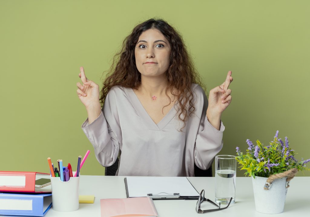 looking concerned young pretty female office worker sitting desk How to Build a Sales Pipeline: 8 Proven Steps
