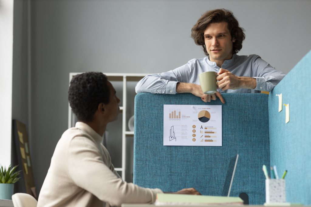medium shot men talking work How to Reduce No Show Rate: 9 Proven Strategies That Work