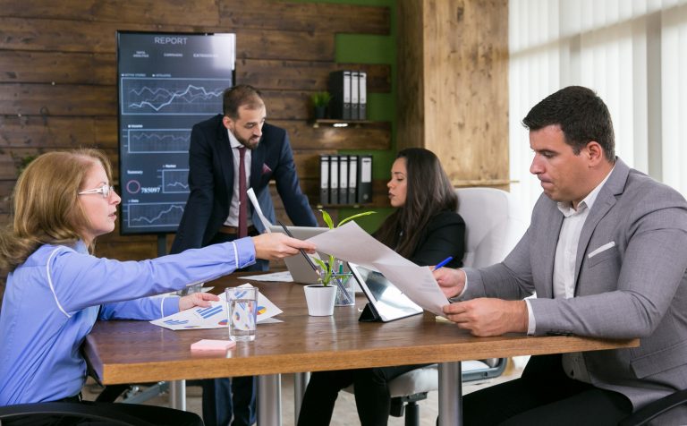 middle age business woman giving charts her young colleague conference room 1 How SentinelGuard Security Increased Risk Assessment Meetings