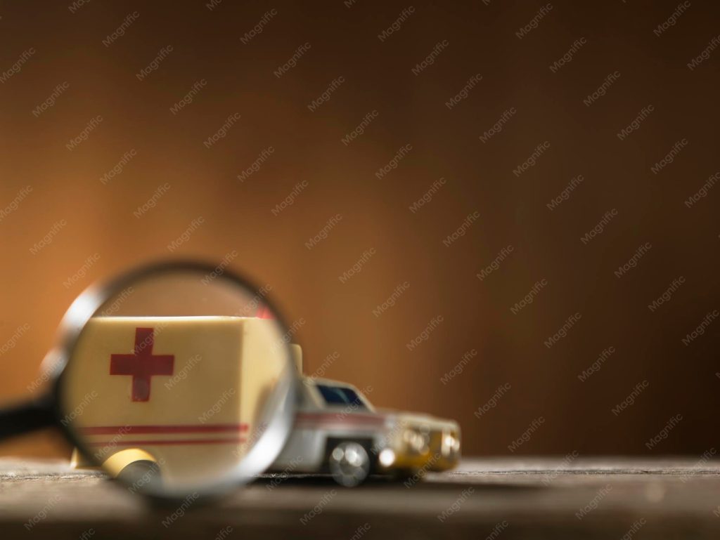 close up toy ambulance car with magnifying glass table 441362 21207 How RapidCare Ambulance Won More Hospital Contracts