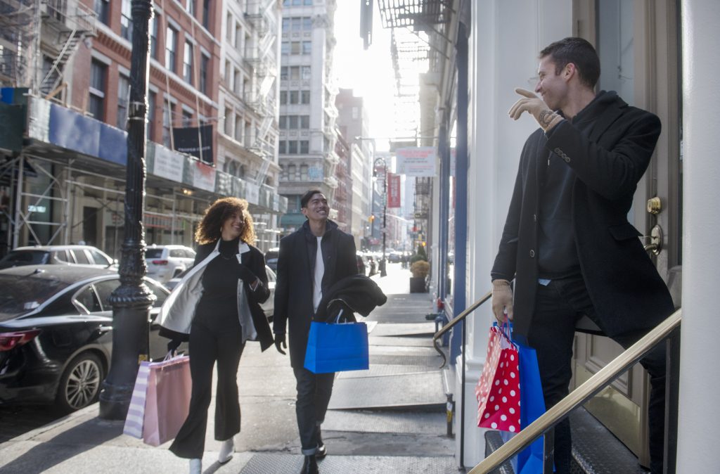 friends having fun shopping together 7 Outbound Sales Trends Shaping the USA